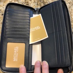 NWT Michael Kors navy leather wallet with silver hardware